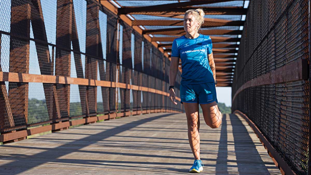 Trainingpeaks Coach Christine Schirtzinger Image Of Trainingpeaks Coach Christine Schirtzinger On A Bridge Warming Up For Running Talking About Dealing With Sexual Assault