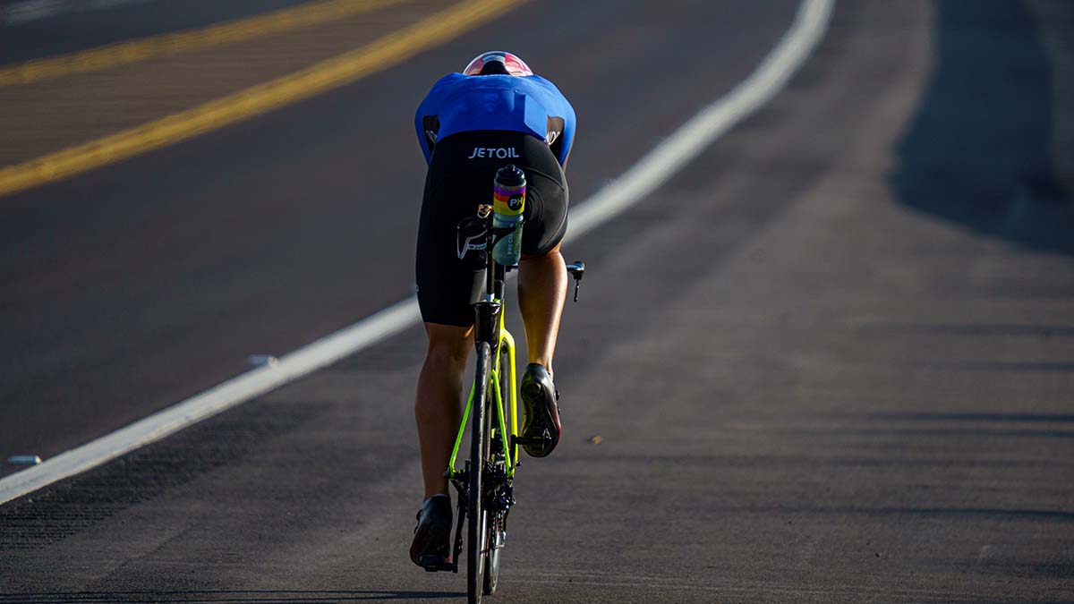 A Male Cyclist Rides His Tt Bike On A Road Near Kona, Hawaii.