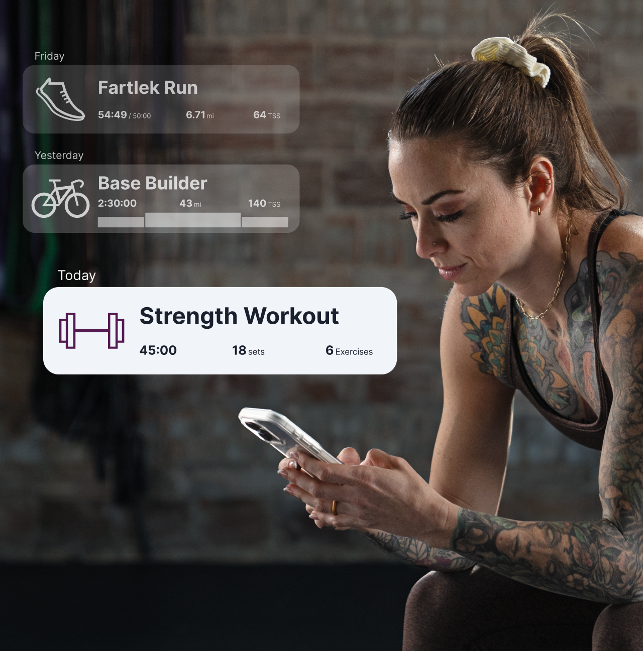 Woman In The Gym Looks At Her Phone. Graphics Of The Trainingpeaks App Are Overlaid On The Image.