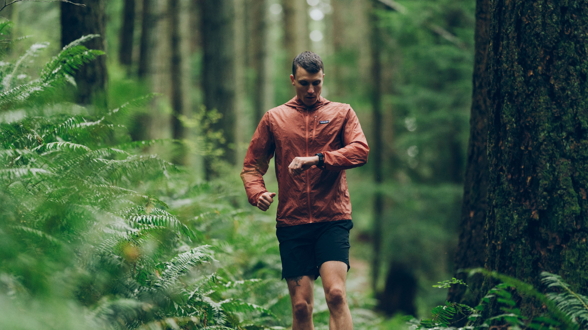 Man Trail Running And Performing Breath Holds.
