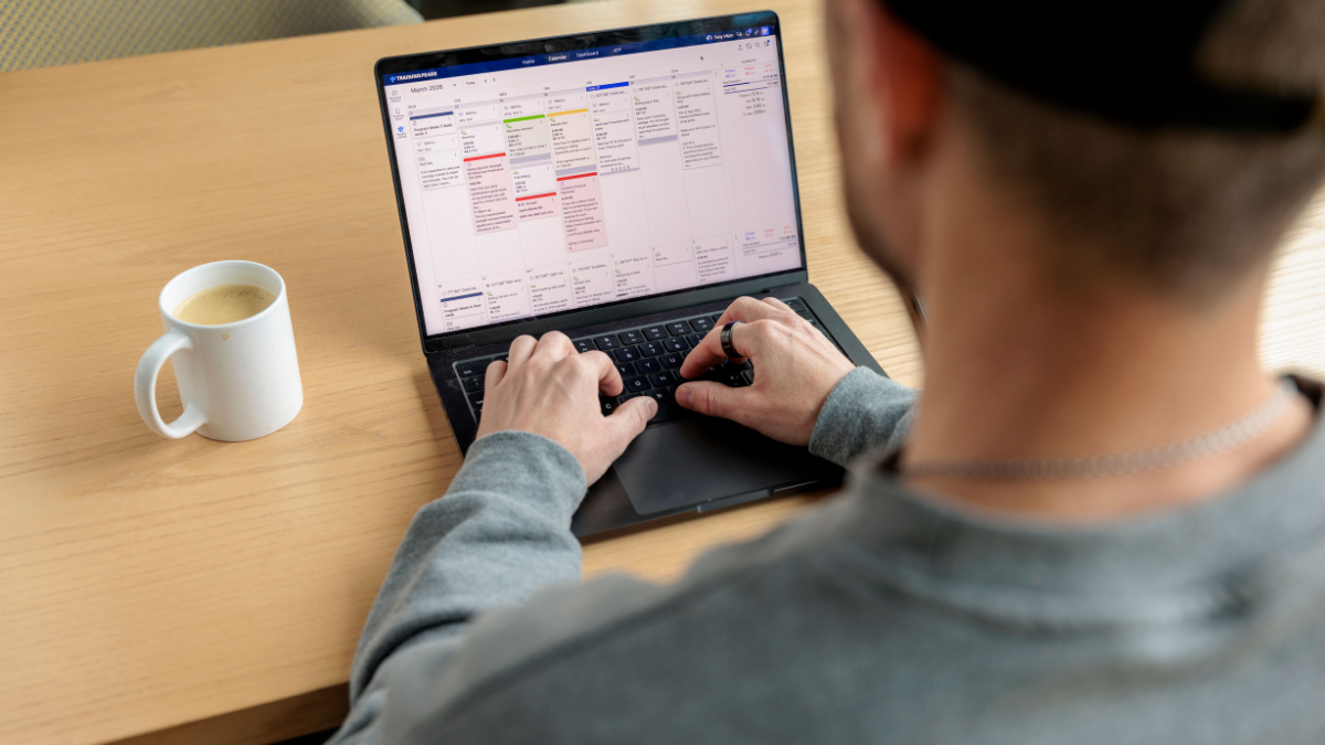 Trainingpeaks Metrics Trainingpeaks Athlete Checking Calendar And Reviews Workout Metrics In The Trainingpeaks Web App.